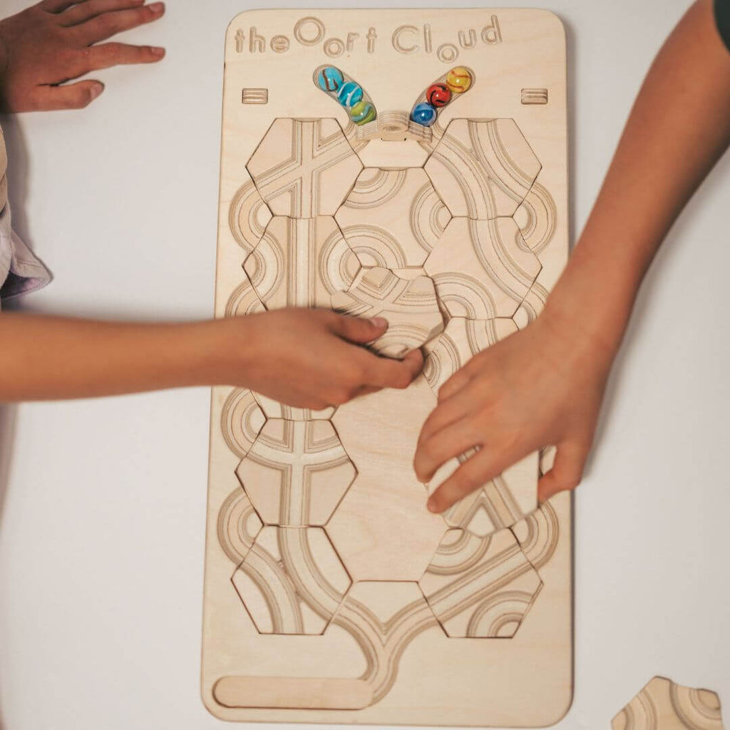 Oort Cloud Marble Run Puzzle Game